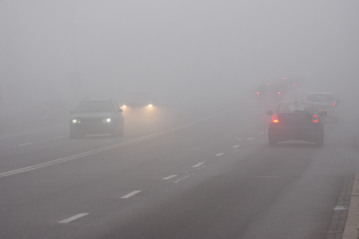 cars driving in fog